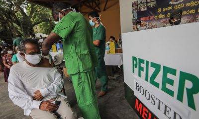 Vacuna de Pfizer es menos eficaz contra hospitalización por ómicron y pastilla es un 'inhibidor potente'